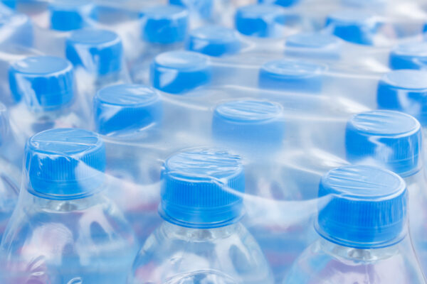 Rows of water bottles in plastic wrap